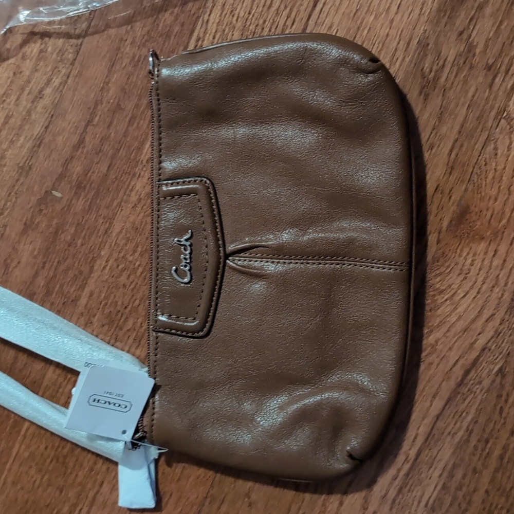NWT still wrapped Brown Leather Wristlet